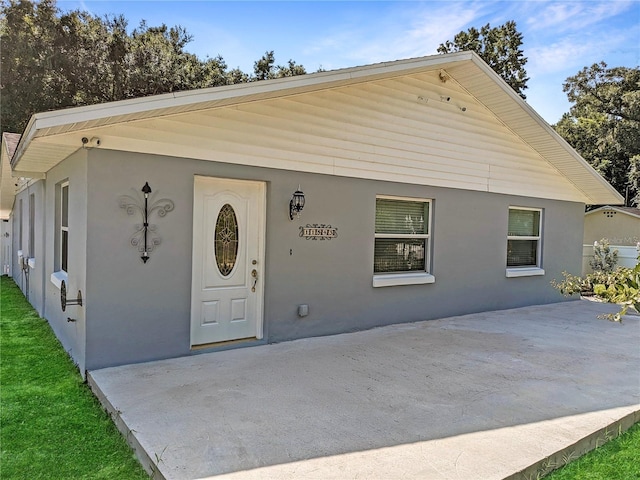 view of front of property with a patio area