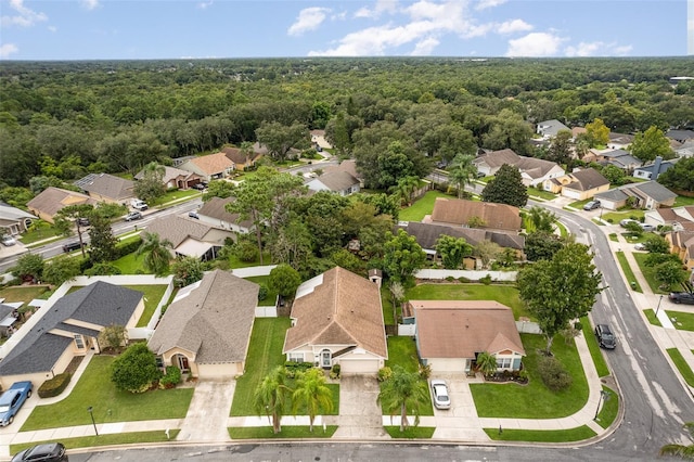 bird's eye view with a residential view and a forest view