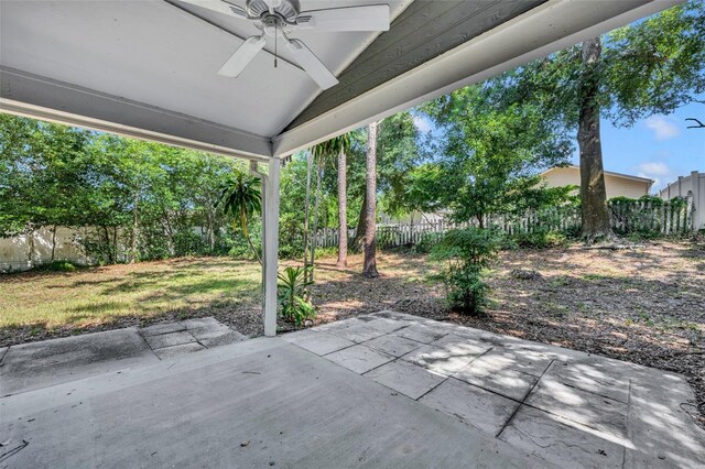 view of patio featuring ceiling fan