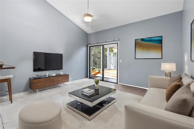 tiled living room with vaulted ceiling