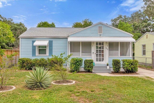 bungalow with a front lawn