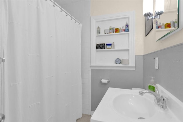 bathroom featuring vanity and a shower with curtain