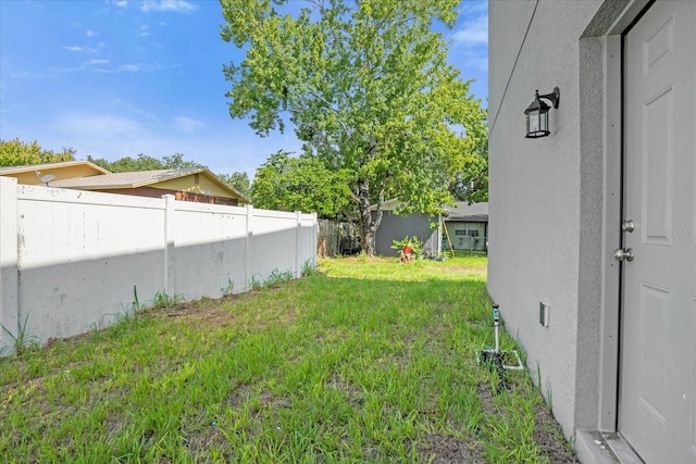 view of yard featuring fence