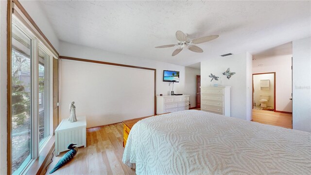 bedroom featuring light hardwood / wood-style flooring and ceiling fan