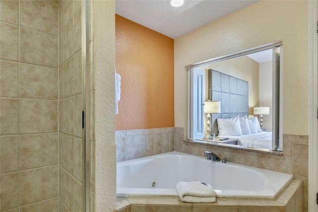 bathroom with tiled bath