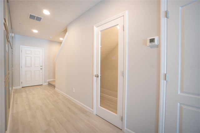 hallway featuring light hardwood / wood-style flooring