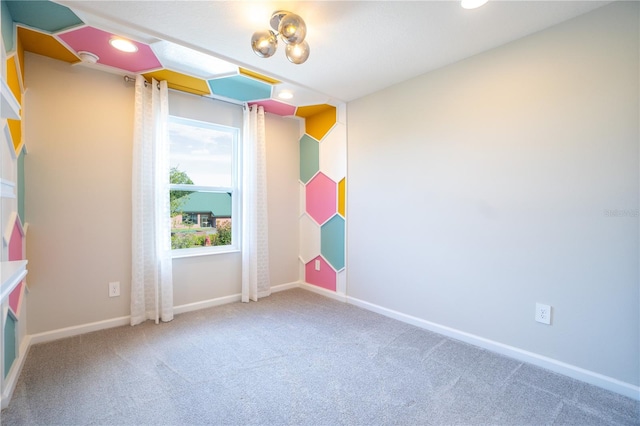 empty room featuring carpet flooring