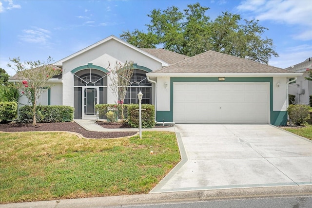 single story home with an attached garage, concrete driveway, roof with shingles, stucco siding, and a front yard