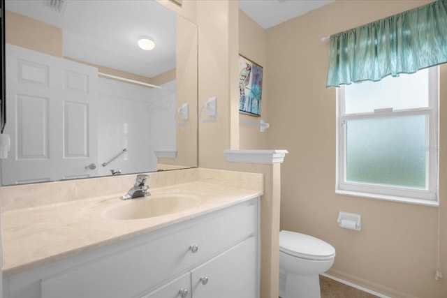 full bath featuring baseboards, visible vents, vanity, and toilet