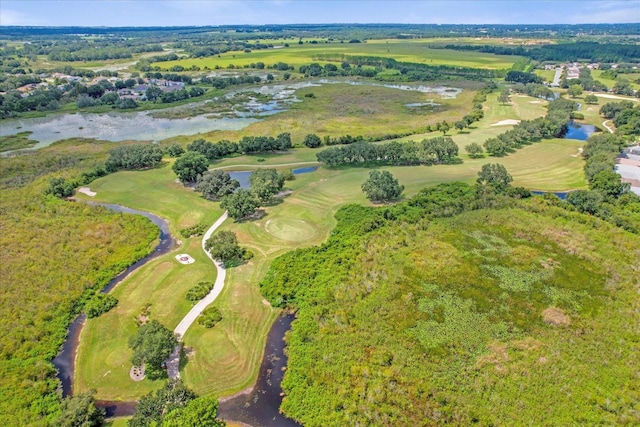 birds eye view of property featuring a water view and golf course view