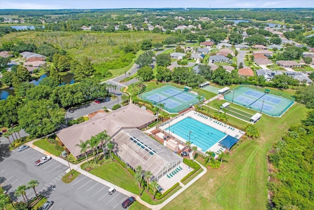 birds eye view of property featuring a water view