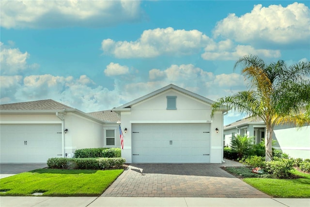 single story home featuring a garage