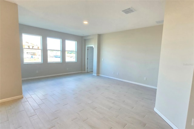 empty room featuring light hardwood / wood-style floors