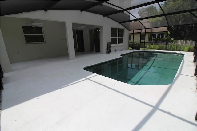 view of pool with a ceiling fan, a lanai, a patio, and a fenced in pool