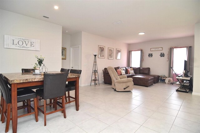 living room featuring light tile patterned floors