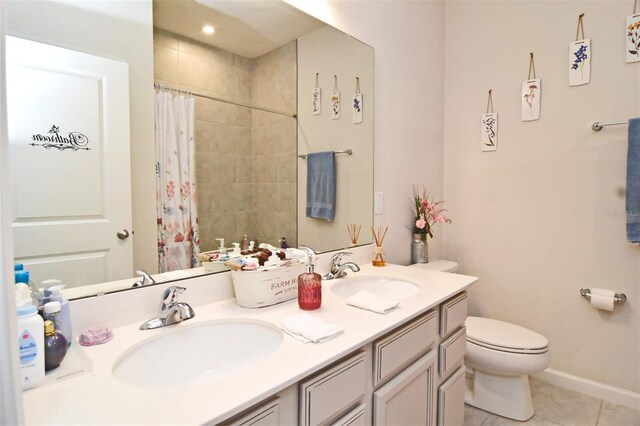 bathroom featuring tile patterned flooring, vanity, toilet, and a shower with curtain