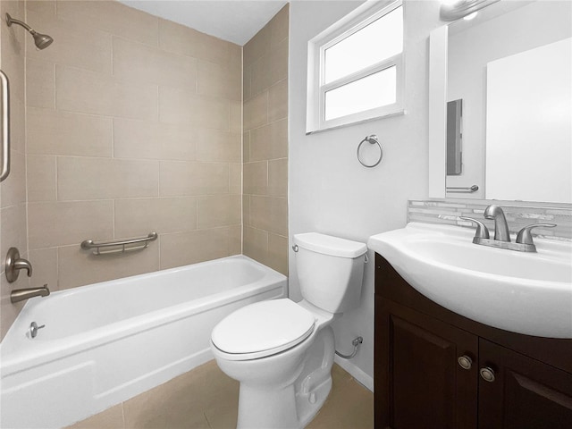 full bathroom featuring toilet, tasteful backsplash, vanity, tile patterned floors, and tiled shower / bath combo