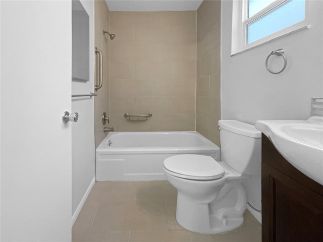 full bathroom featuring tile patterned floors, vanity, tiled shower / bath combo, and toilet