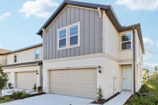 view of front of home with a garage