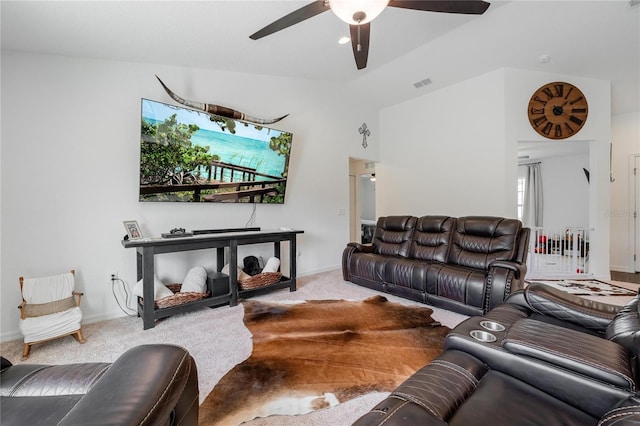 living room with ceiling fan and carpet