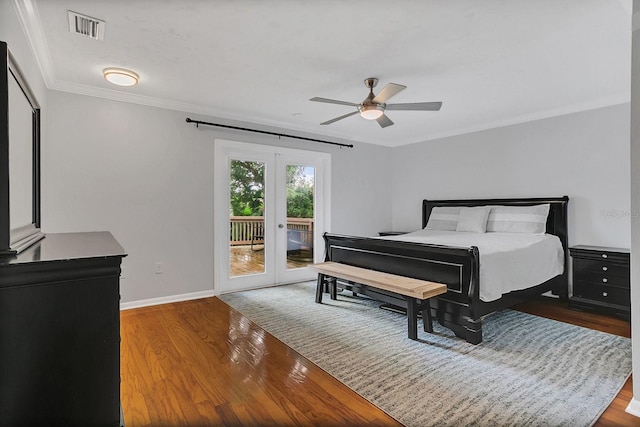 bedroom with access to exterior, french doors, visible vents, ornamental molding, and wood finished floors