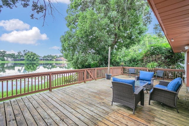 deck with a water view and an outdoor hangout area