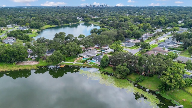 drone / aerial view with a residential view and a water view