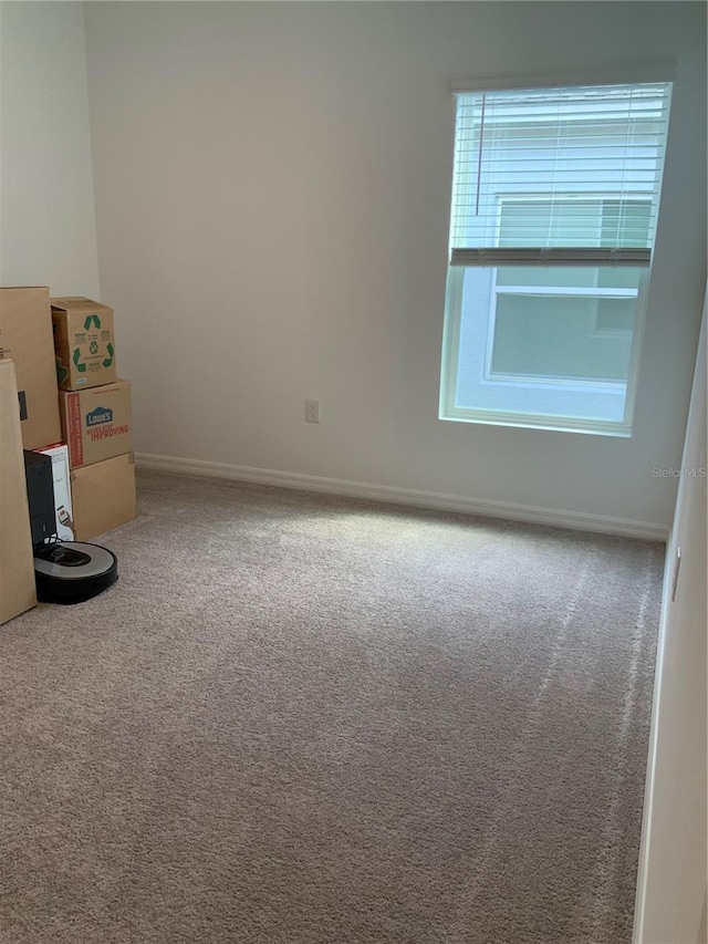 5639 Costa Blanca Way, Davenport, FL 33897 - unfurnished room with carpet flooring and baseboards