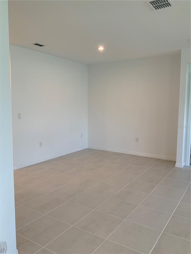 5639 Costa Blanca Way, Davenport, FL 33897 - empty room featuring light tile patterned floors and recessed lighting