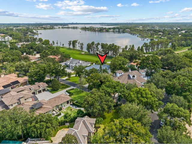 bird's eye view featuring a residential view and a water view
