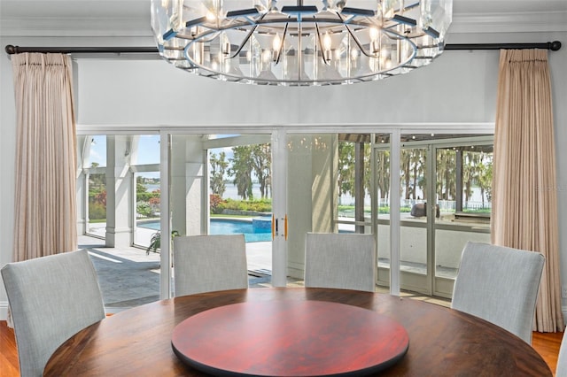 dining area with an inviting chandelier