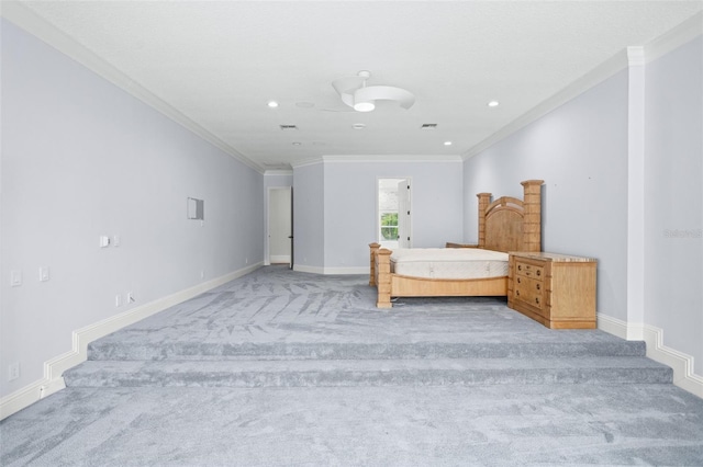 unfurnished bedroom featuring ceiling fan, carpet, and ornamental molding