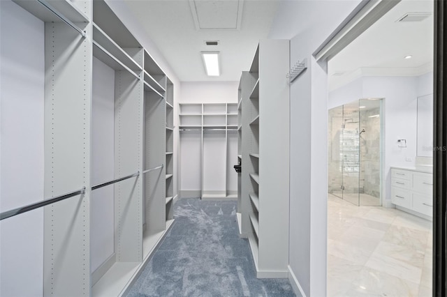 walk in closet featuring tile patterned floors