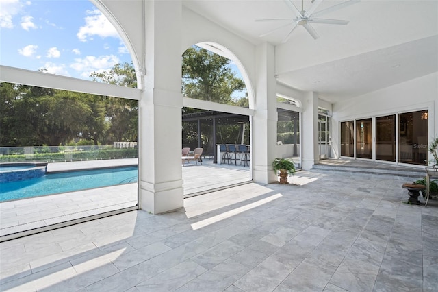 view of pool featuring a patio and ceiling fan