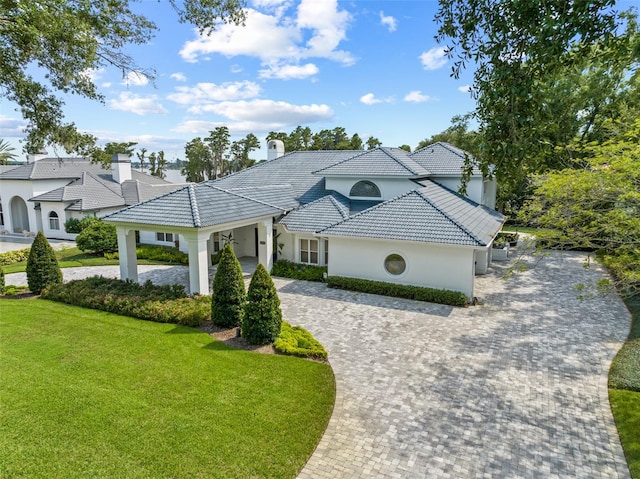 view of front of home with a front lawn