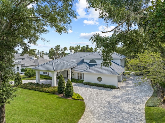 view of front of home with a front yard