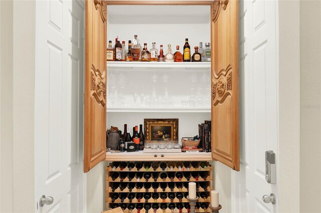 wine room featuring a bar