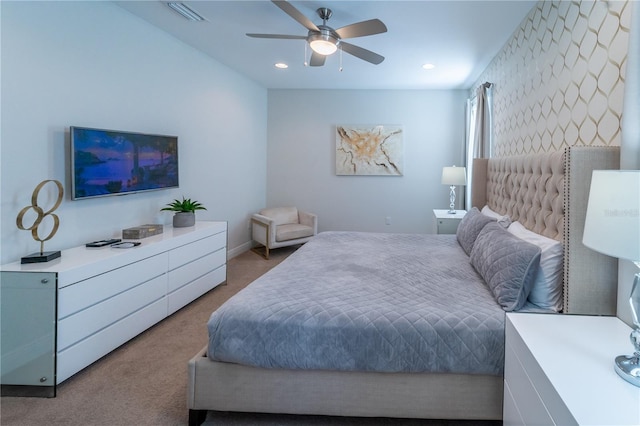 carpeted bedroom with ceiling fan