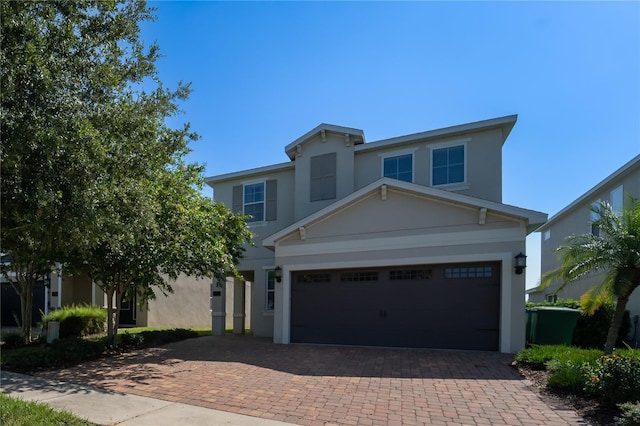 view of front of home with a garage