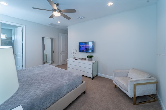 bedroom with ceiling fan and light carpet