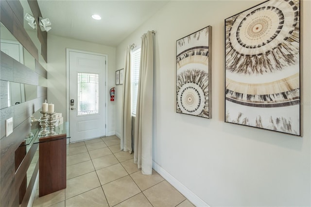 hallway featuring light tile patterned flooring