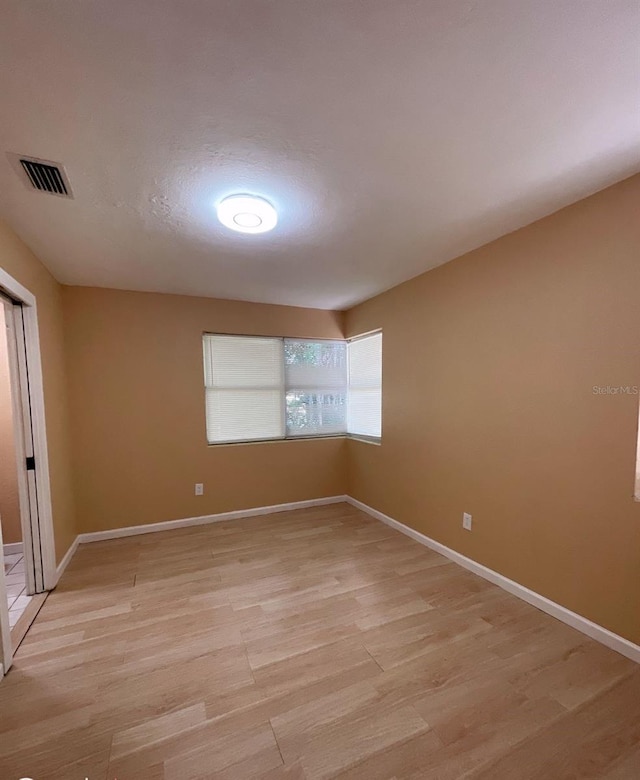 empty room featuring light wood-type flooring