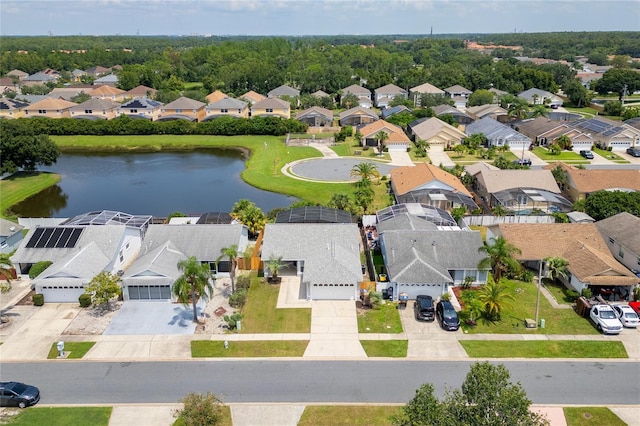 aerial view featuring a water view and a residential view