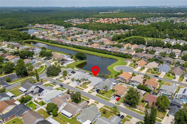 bird's eye view with a water view and a residential view