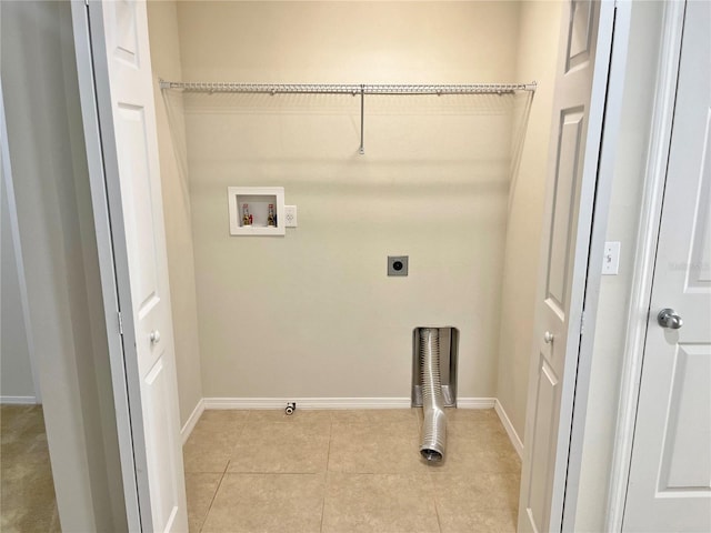 laundry area with washer hookup, electric dryer hookup, and light tile patterned floors