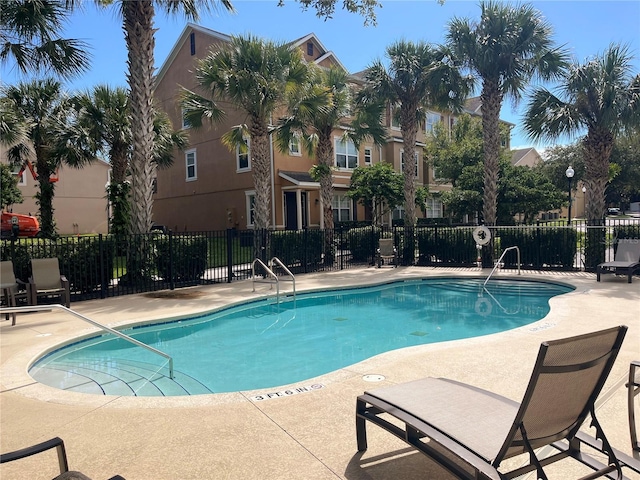 view of swimming pool featuring a patio