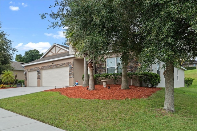 view of front facade with a front lawn and a garage