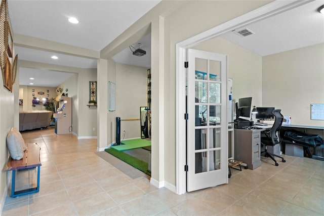 interior space featuring light tile patterned flooring