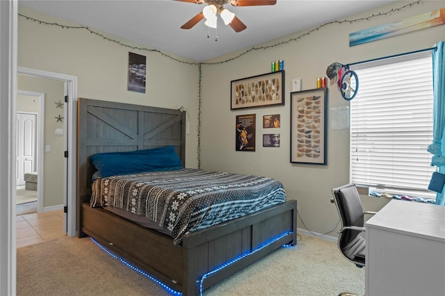 bedroom with ceiling fan and light colored carpet