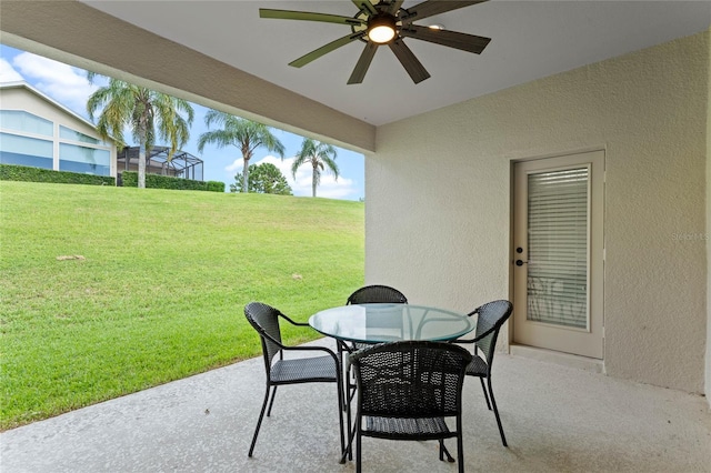 view of patio / terrace featuring ceiling fan